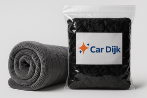 CarDijk Polder microvezel droogdoek: opgerolde grijze droogdoek naast de verpakking met CarDijk-logo